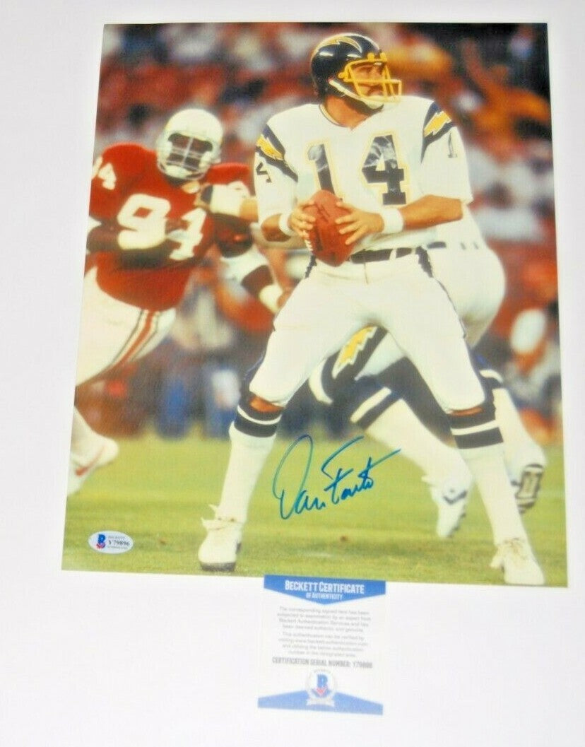 DAN FOUTS signed (SAN DIEGO CHARGERS) football 11X14 photo BECKETT BAS #2