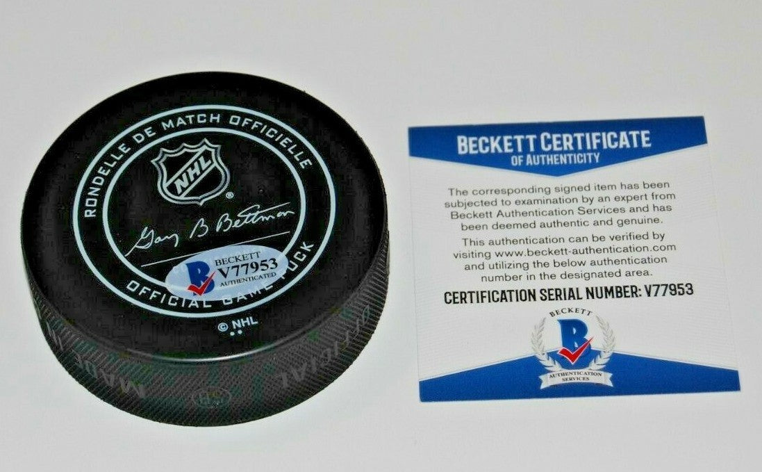 PATRICK LAINE signed (WINNIPEG JETS) Official game hockey puck BECKETT BAS