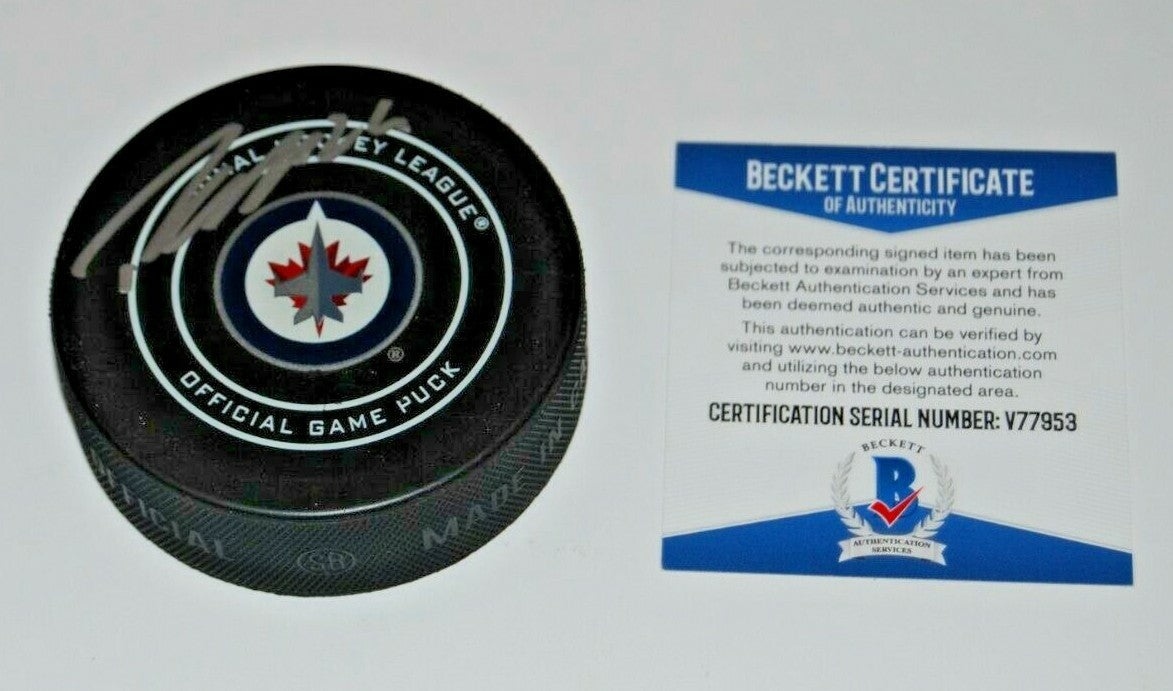 PATRICK LAINE signed (WINNIPEG JETS) Official game hockey puck BECKETT BAS