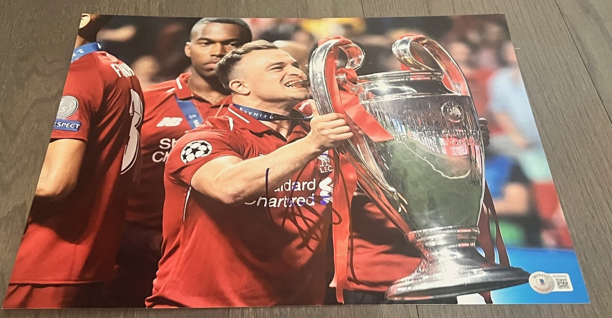 XHERDAN SHAQIRI signed (LIVERPOOL Switzerland Soccer 11X14 photo BECKETT AC93452