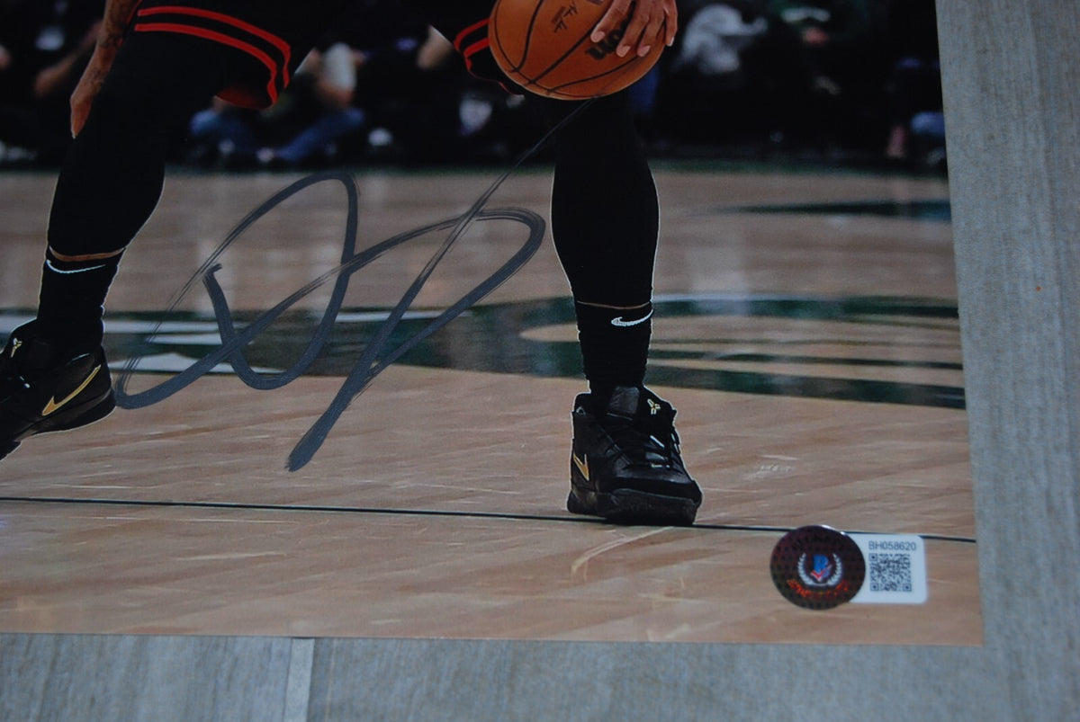 DEMAR DEROZAN signed (CHICAGO BULLS) autographed 11X14 photo BECKETT BH058620