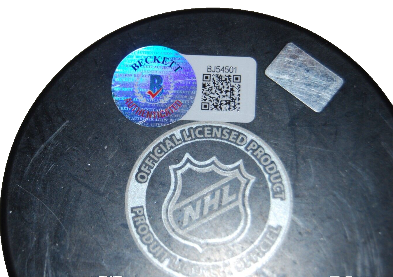 MATHEW BARZAL signed (NEW YORK ISLANDERS) hockey puck BECKETT BAS BJ54501
