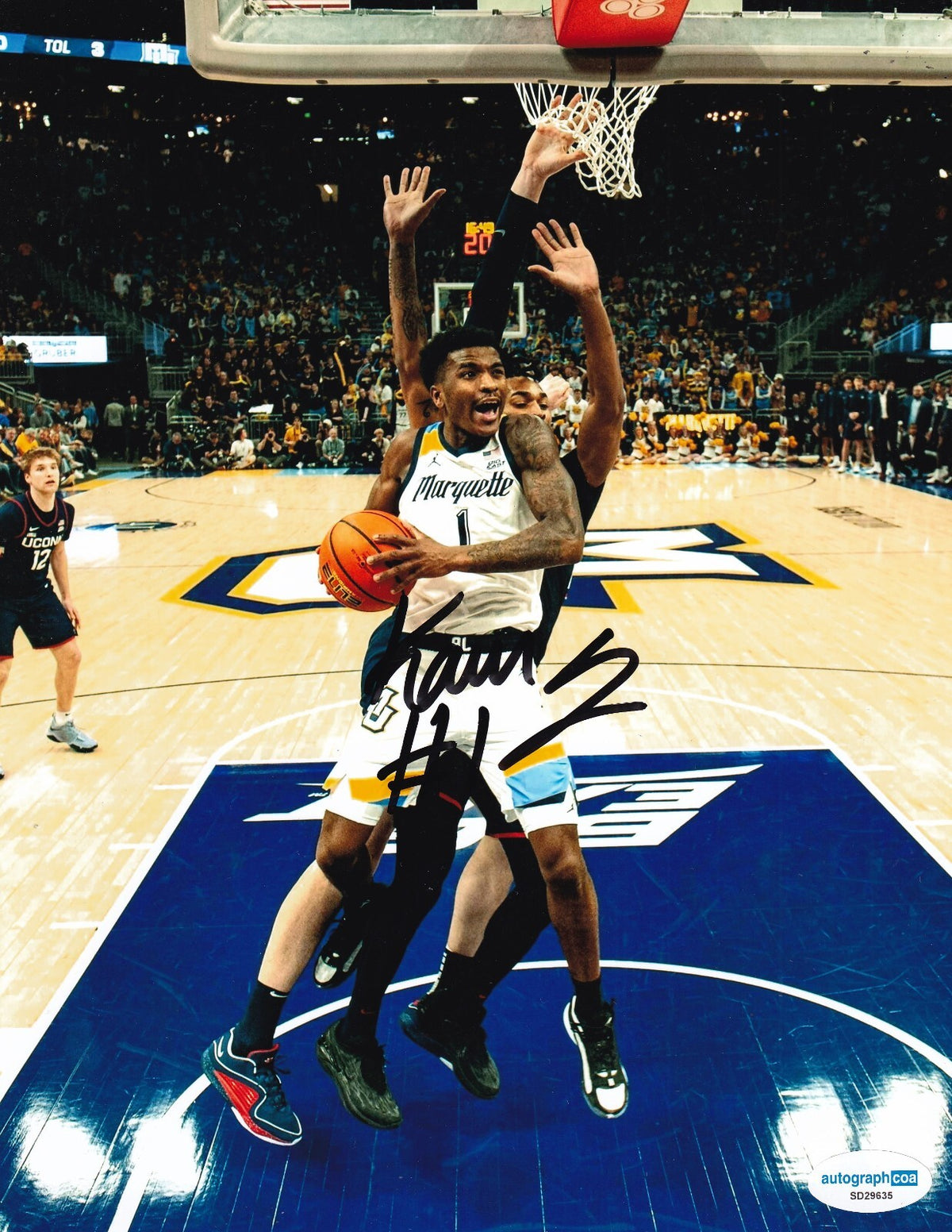 KAM JONES signed (MARQUETTE GOLDEN EAGLES) basketball 8X10 photo ACOA SD29635