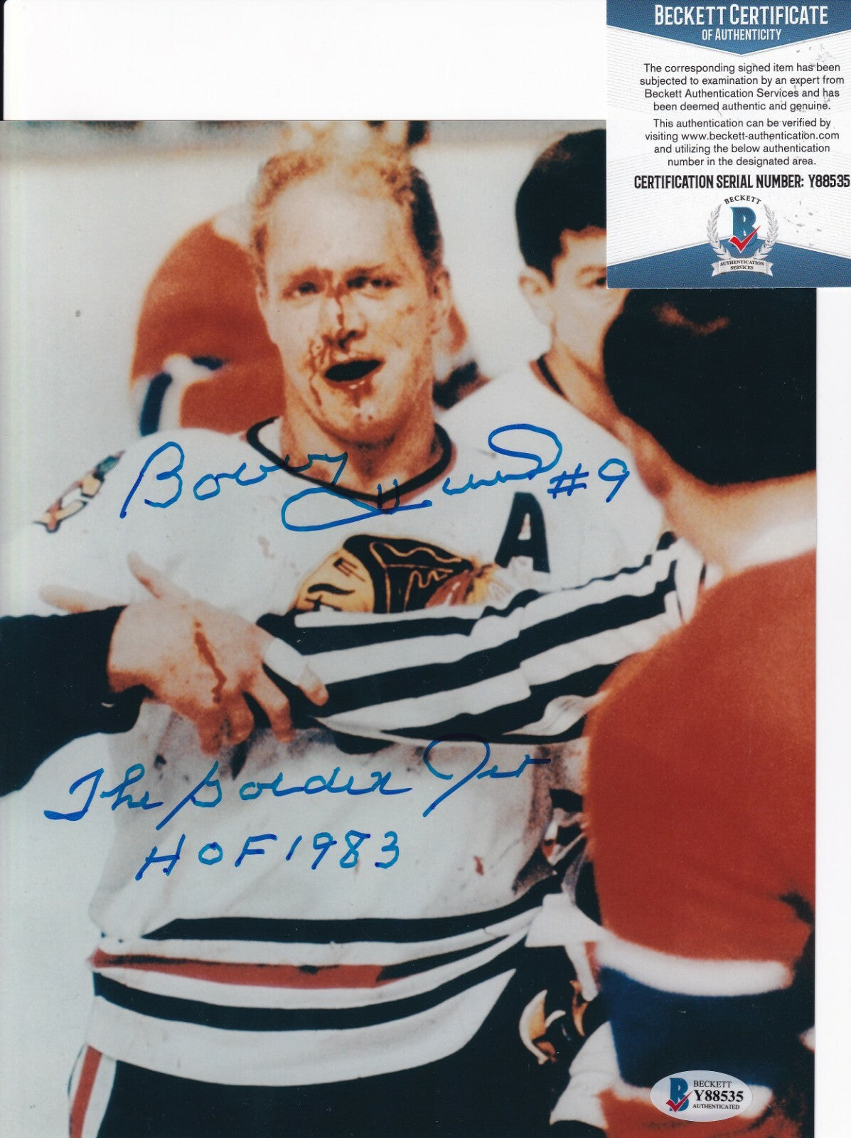 BOBBY HULL signed (CHICAGO BLACKHAWKS) Bloody 8X10 photo BECKETT BAS Y88535
