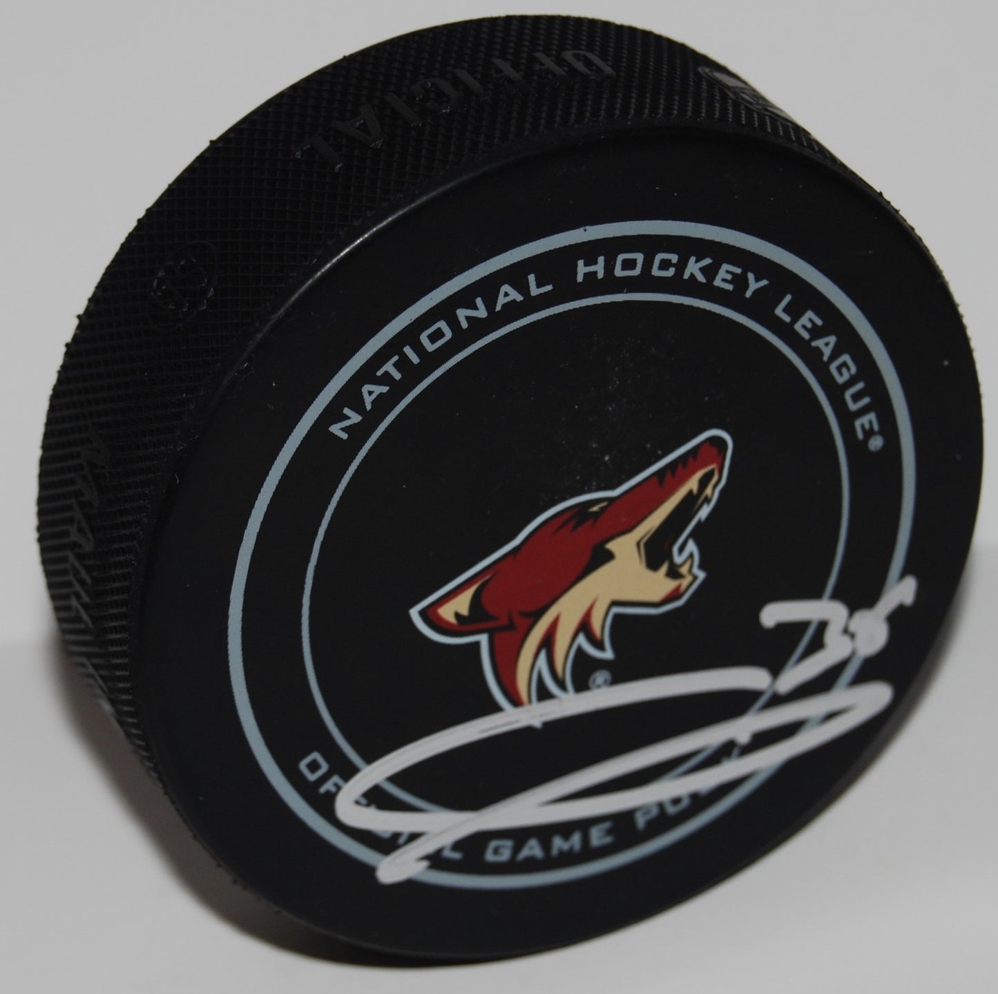 CHRISTIAN FISCHER signed (PHOENIX COYOTES) Official game hockey puck W/COA