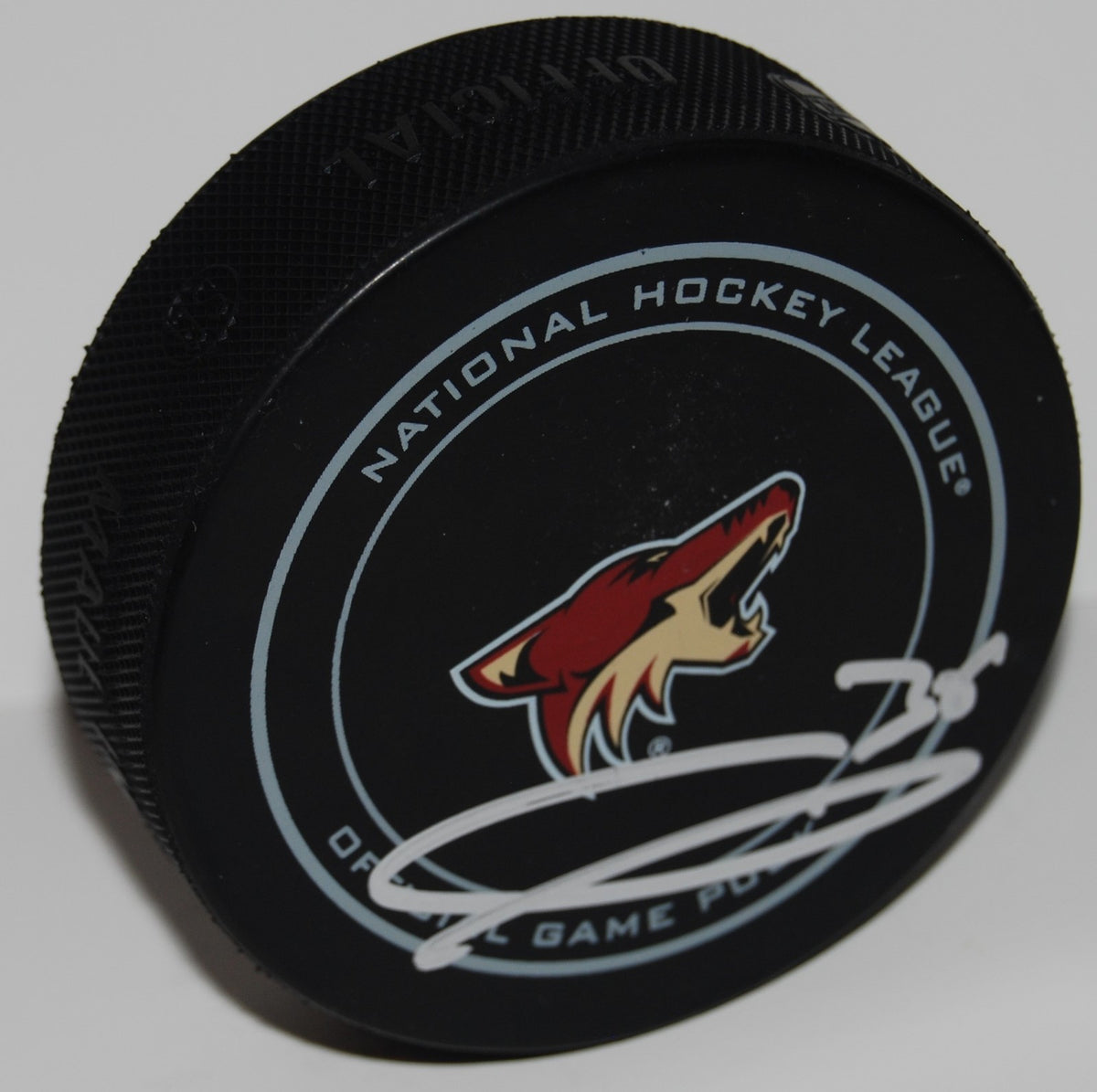 CHRISTIAN FISCHER signed (PHOENIX COYOTES) Official game hockey puck W/COA