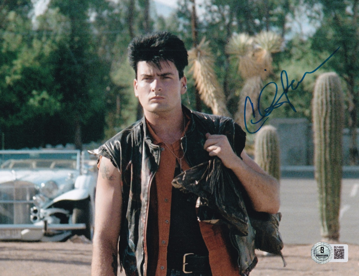 CHARLIE SHEEN signed (MAJOR LEAGUE) Rick Vaughn movie 8X10 photo BECKETT BU14990