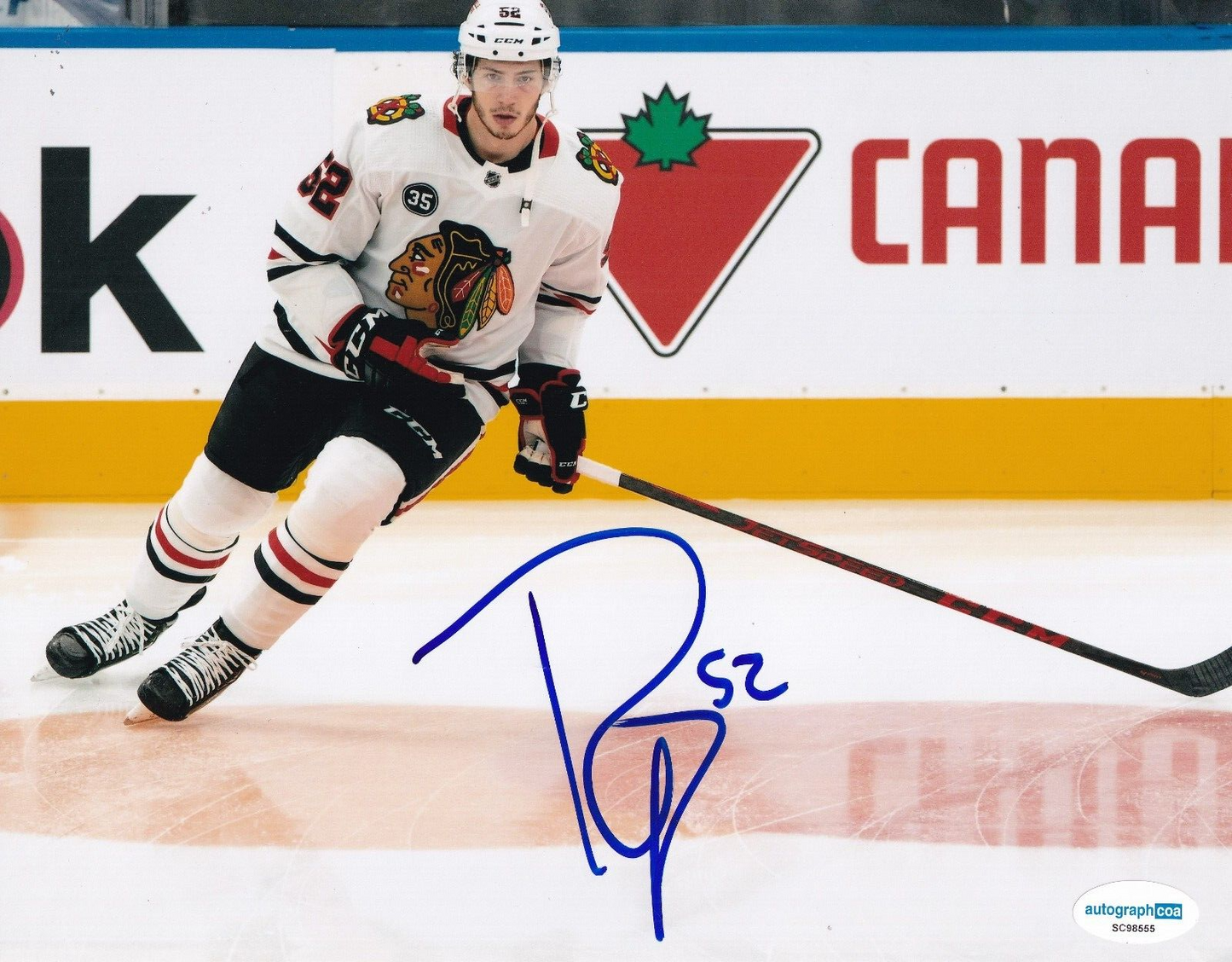 REESE JOHNSON signed (CHICAGO BLACKHAWKS) Hockey 8X10 photo ACOA SC98555