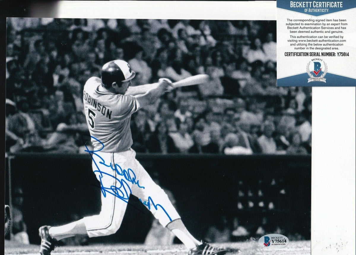 BROOKS ROBINSON signed (BALTIMORE ORIOLES) baseball 8X10 photo BECKETT Y75614