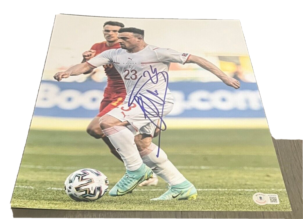 XHERDAN SHAQIRI signed (LIVERPOOL Switzerland Soccer 11X14 photo BECKETT AC93454
