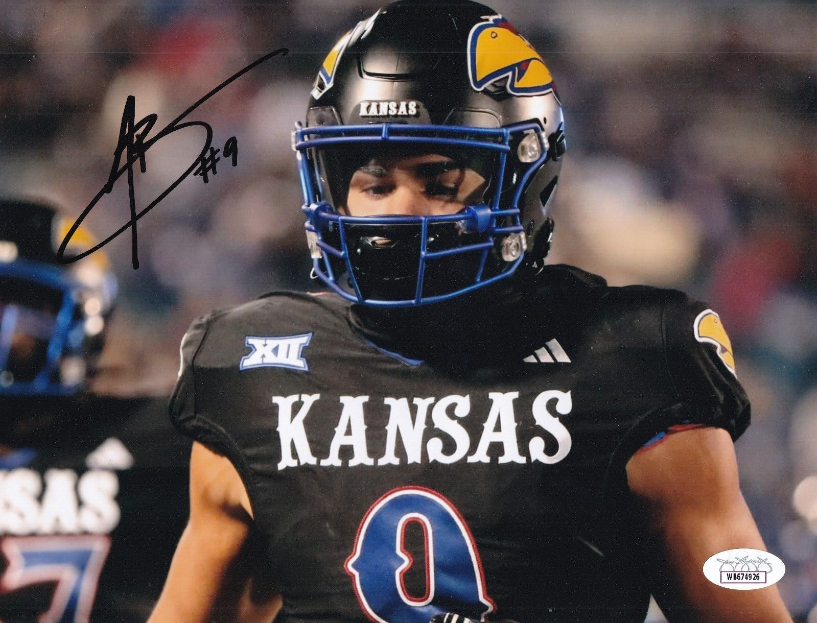 AUSTIN BOOKER signed (KANSAS JAYHAWKS) Football 8X10 photo JSA Witness WB674926