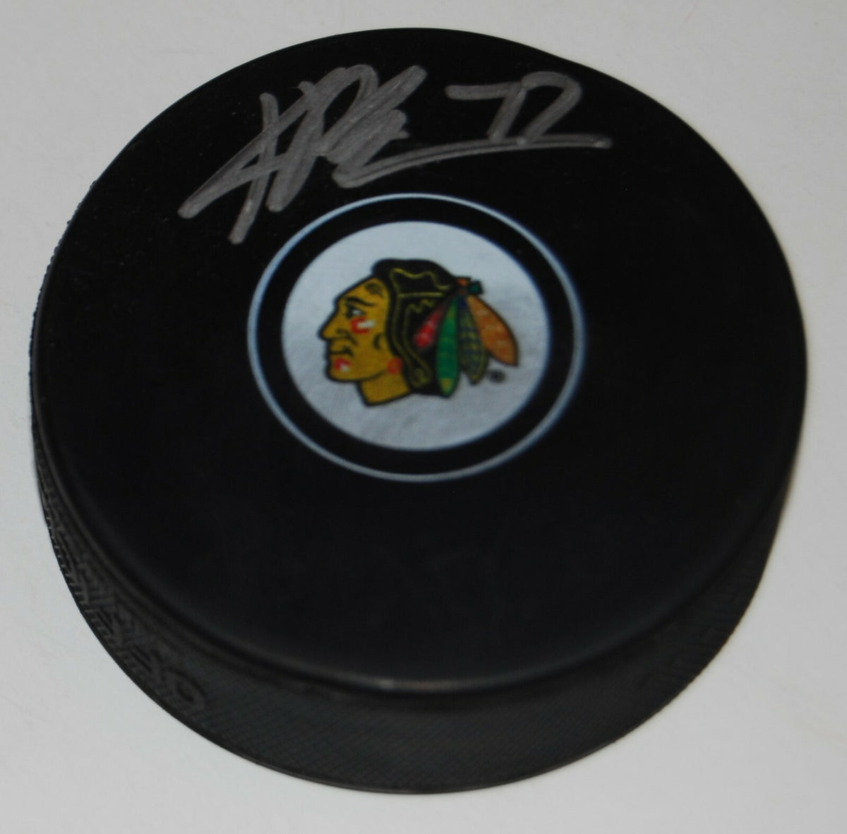 KIRBY DACH signed (CHICAGO BLACKHAWKS) Rookie autographed hockey puck W/COA