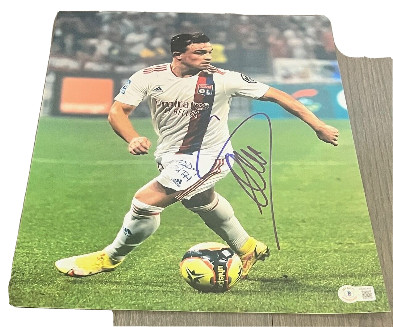 XHERDAN SHAQIRI signed (OLYMPIQUE LYONNAIS) Soccer 11X14 photo BECKETT AC93456