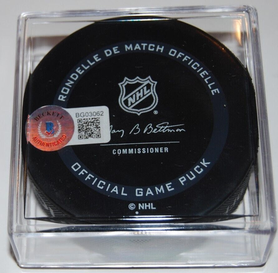 ED BELFOUR signed (CHICAGO BLACKHAWKS) Official game hockey puck BECKETT BG03062
