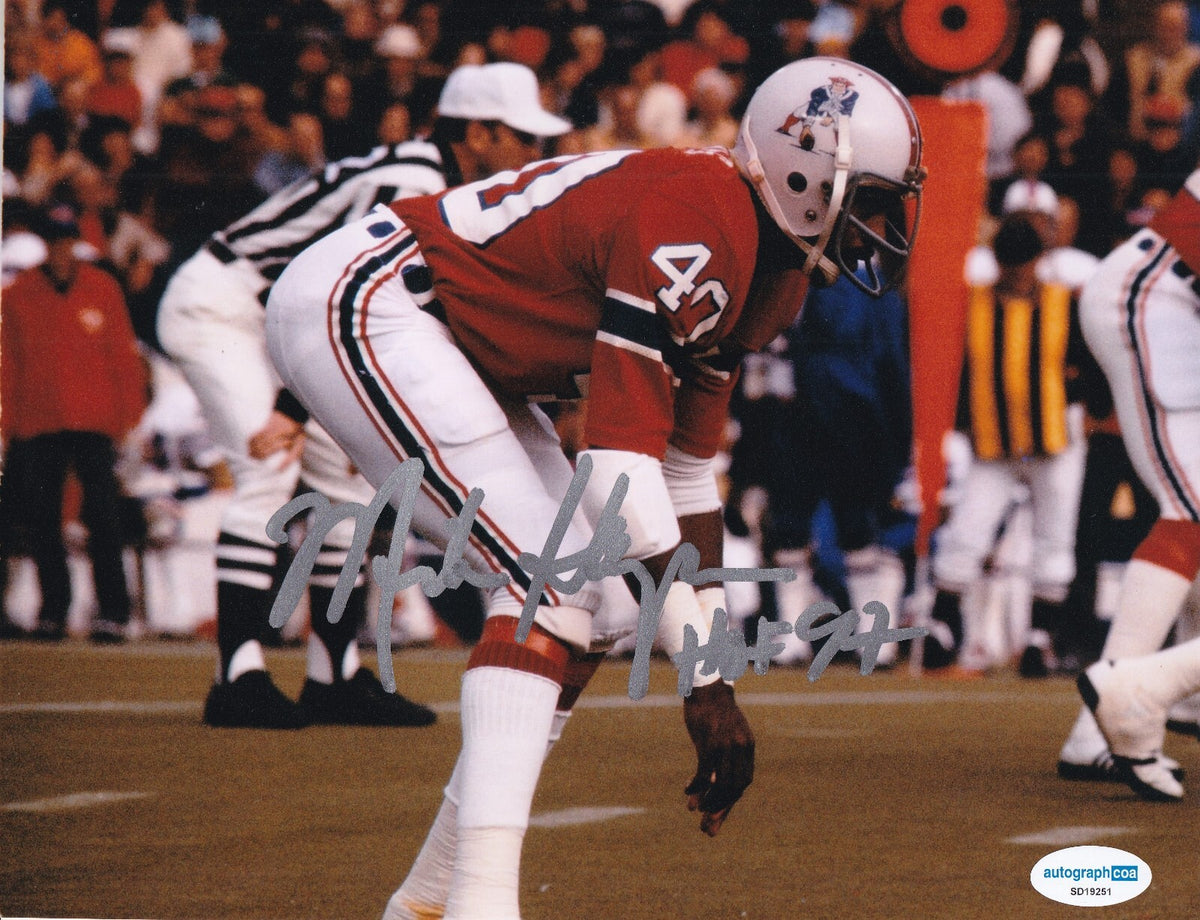 MIKE HAYNES signed (NEW ENGLAND PATRIOTS) Football 8X10 photo ACOA SD19251