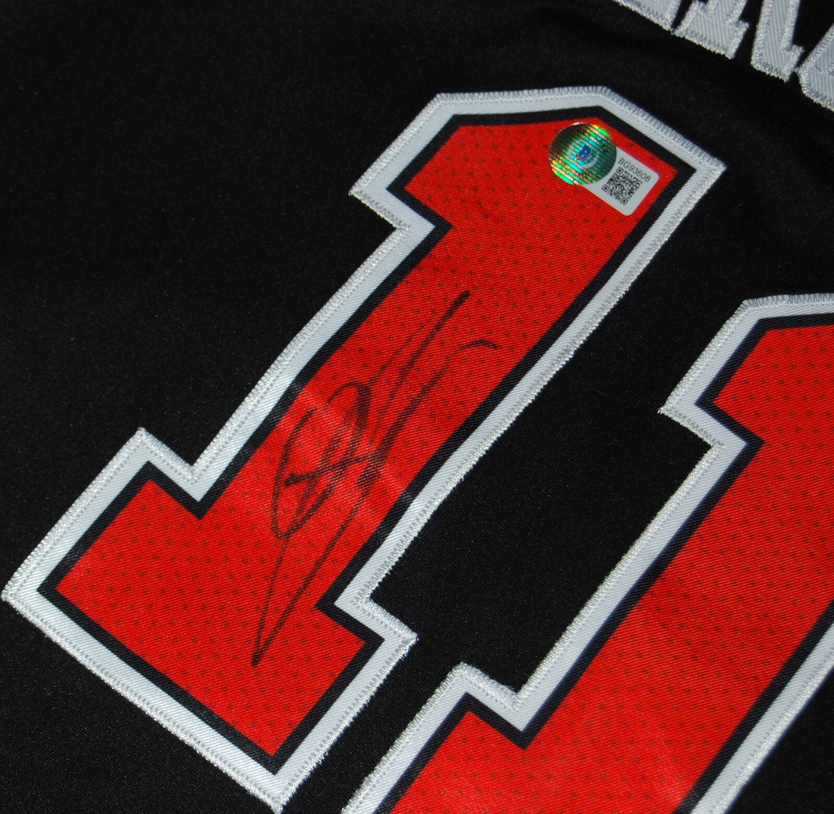 DEMAR DEROZAN signed (CHICAGO BULLS) Black Basketball jersey BECKETT BAS BG93608