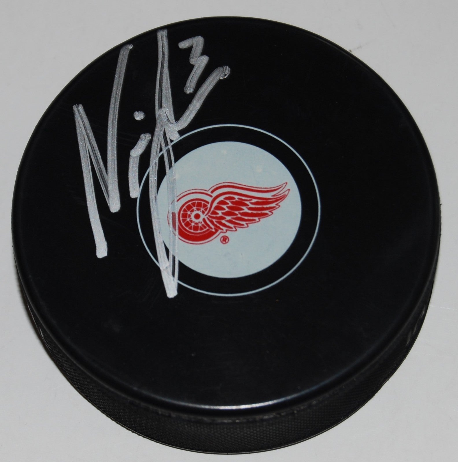 NICK JENSEN signed (DETROIT RED WINGS) souvenir logo hockey puck W/COA