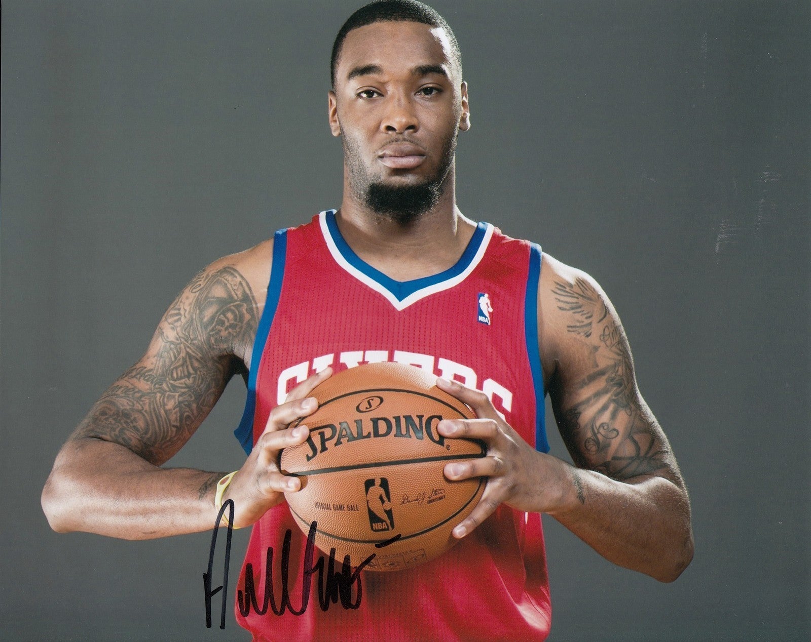 ARNETT MOULTRIE signed *PHILADELPHIA 76ERS* basketball 8X10 photo W/COA