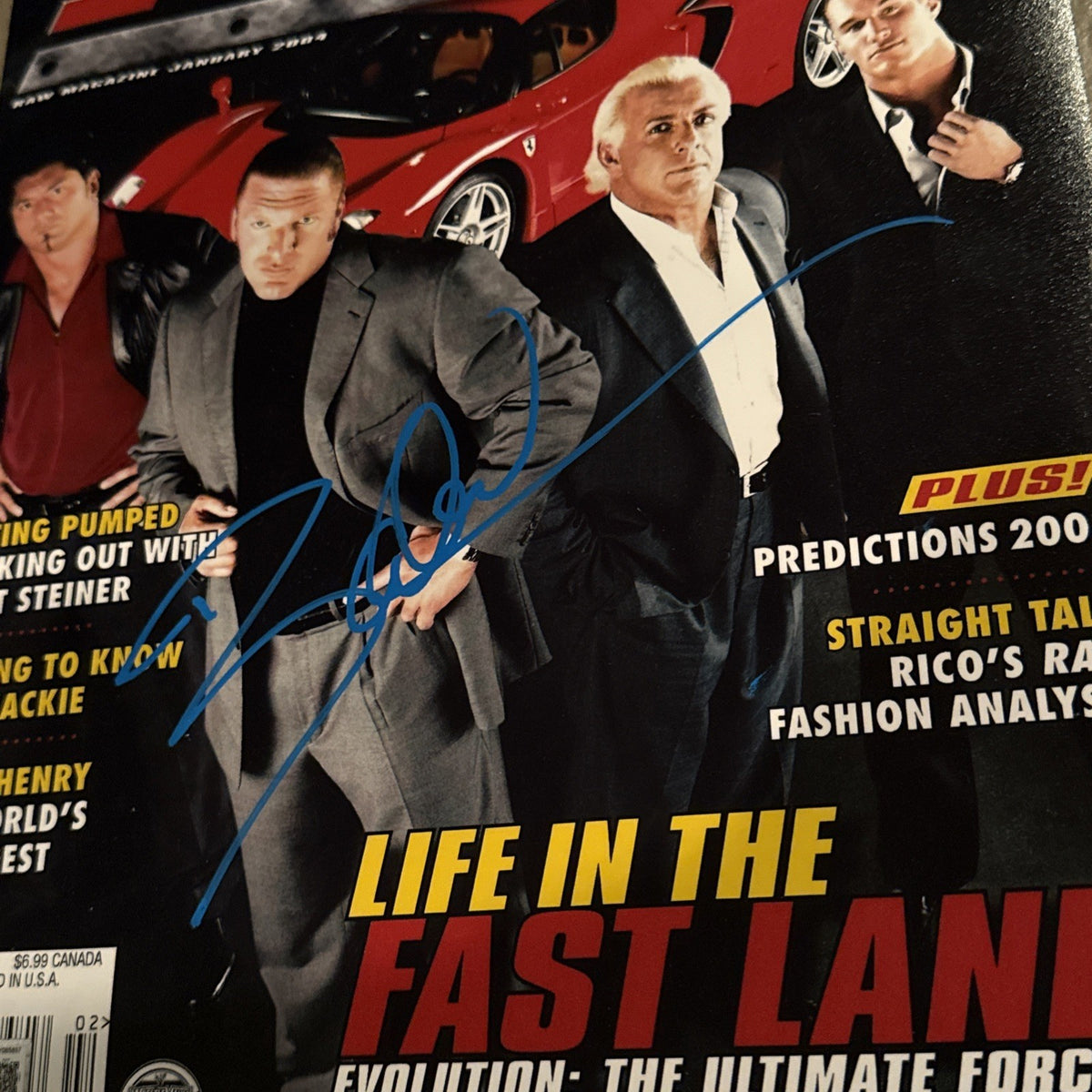 DAVE BAUTISTA signed (WWF) Wrestling Raw 11x14 photo BECKETT BAS BY085857