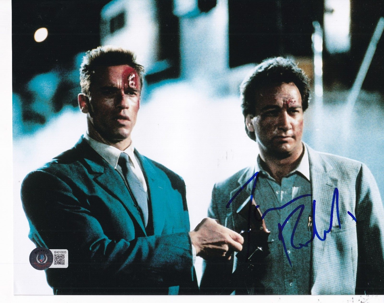 JIM BELUSHI signed (RED HEAT) Art Ridzik Movie 8X10 photo BECKETT BH010935