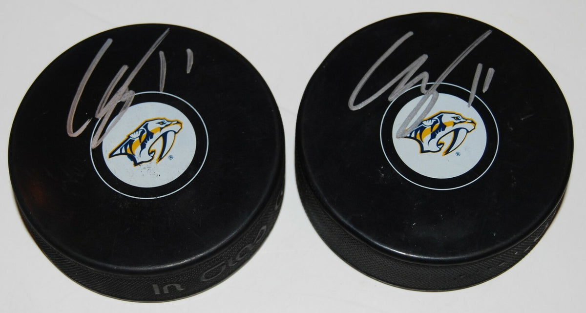 EELI TOLVANEN signed (NASHVILLE PREDATORS) Souvenir hockey logo puck W/COA