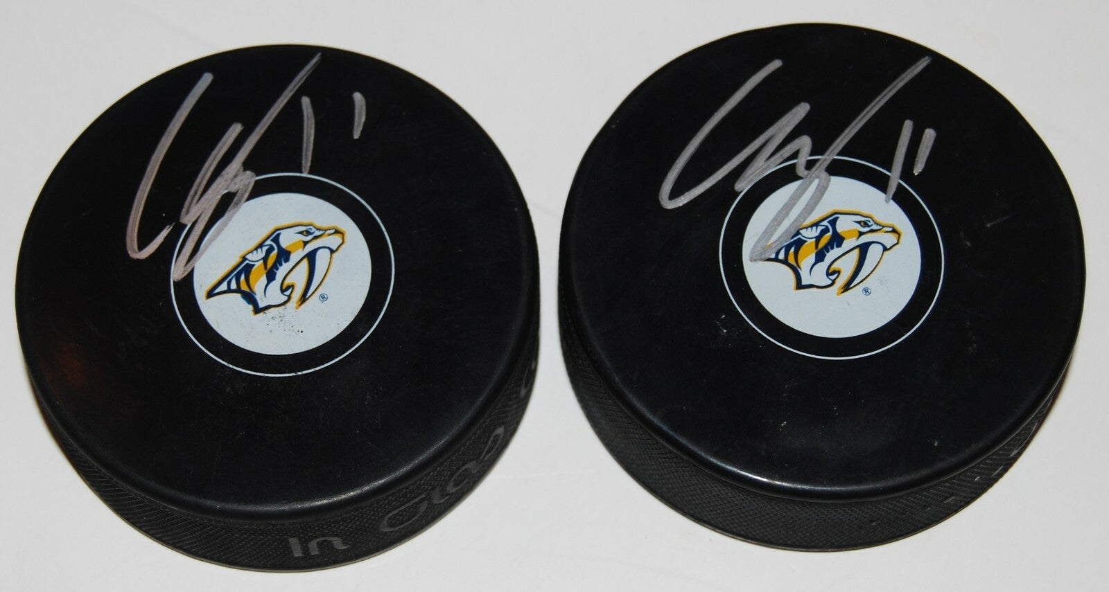 EELI TOLVANEN signed (NASHVILLE PREDATORS) Souvenir hockey logo puck W/COA