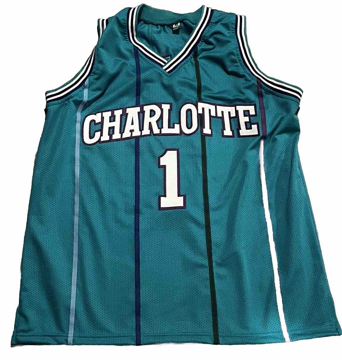 MUGSEY BOGUES signed (CHARLOTTE HORNETS) Pin Stripe basketball jersey Beckett