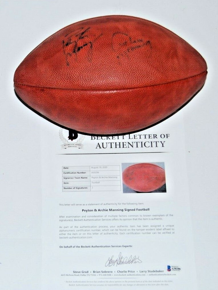 PEYTON and ARCHIE MANNING signed WILSON NFL game football BECKETT BAS FATHER SON