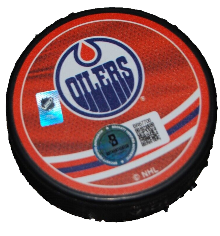 PAUL COFFEY signed (EDMONTON OILERS) hockey puck BECKETT BAS BR67706