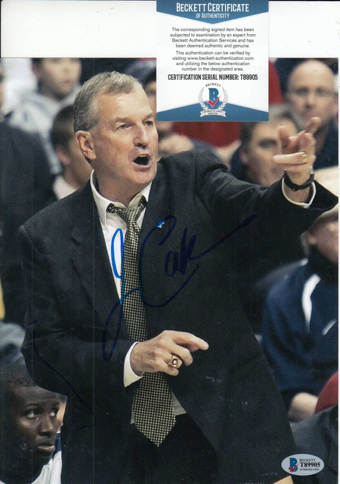 JIM CALHOUN signed (UCONN HUSKIES) Basketball 8X10 photo BECKETT BAS T89905