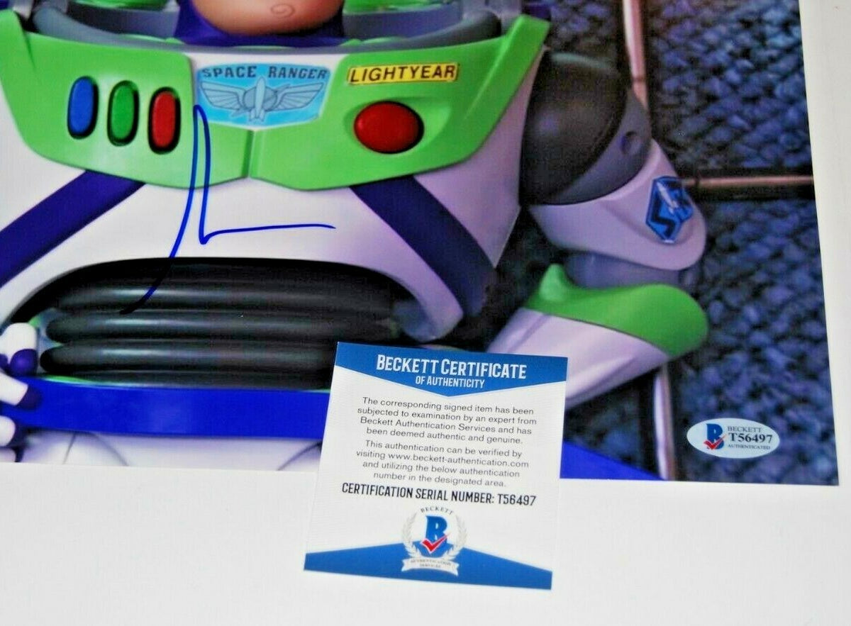 TIM ALLEN signed (TOY STORY 4) Movie 11X14 (BUZZ LIGHTYEAR) *PROOF* BECKETT BAS
