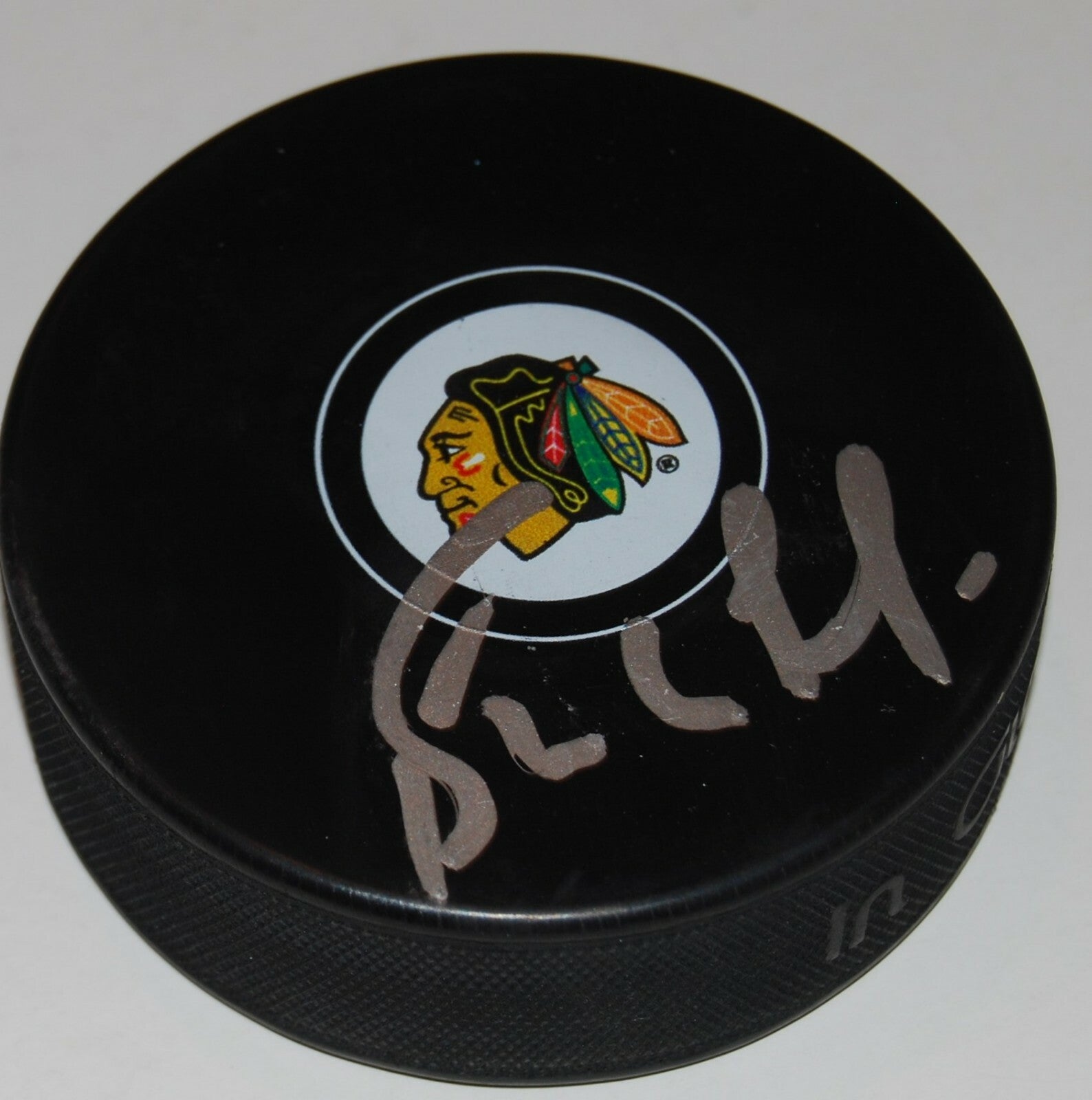 BERNIE NICHOLLS signed (CHICAGO BLACKHAWKS) souvenir logo hockey puck W/COA