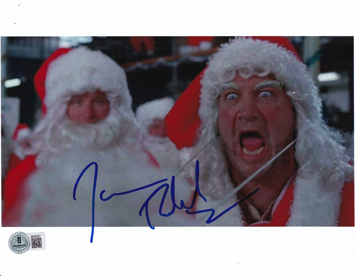 JIM BELUSHI signed (JINGLE ALL THE WAY) Santa Movie 8X10 photo BECKETT BR00227