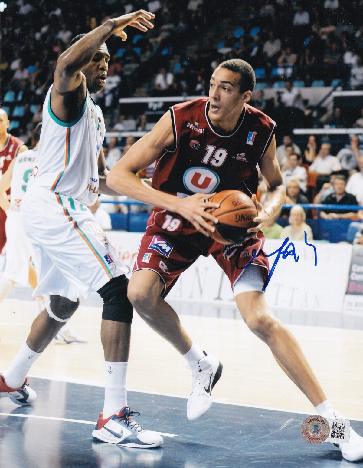 RUDY GOBERT signed (MINNESOTA TIMBERWOLVES) 8X10 photo BECKETT BAS BL52524