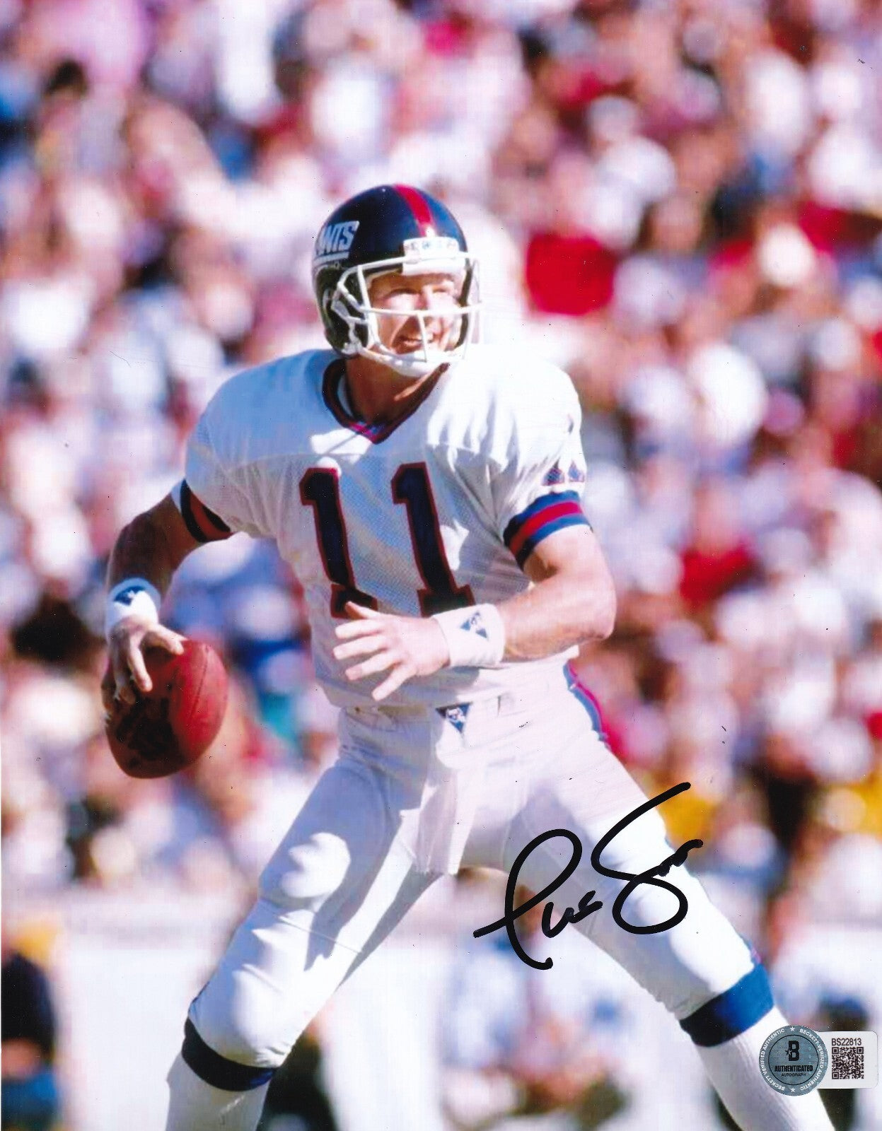 PHIL SIMMS signed (NEW YORK GIANTS) football 8X10 photo BECKETT BAS BS22813