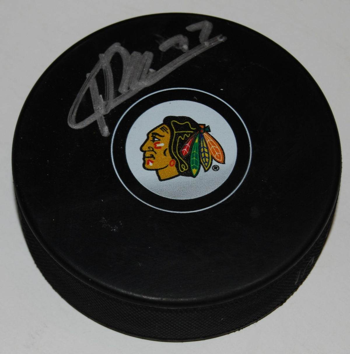 KIRBY DACH signed (CHICAGO BLACKHAWKS) Rookie autographed hockey puck W/COA