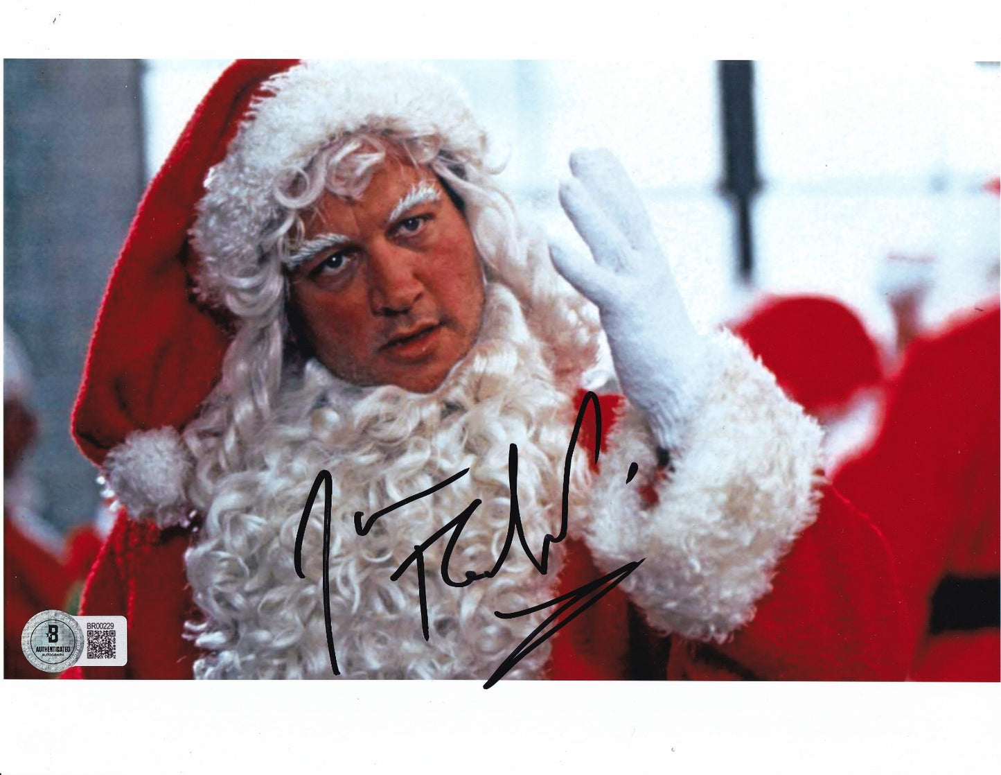 JIM BELUSHI signed (JINGLE ALL THE WAY) Santa Movie 8X10 photo BECKETT BR00229