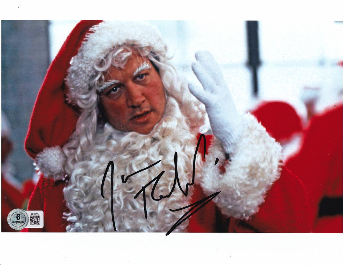 JIM BELUSHI signed (JINGLE ALL THE WAY) Santa Movie 8X10 photo BECKETT BR00229