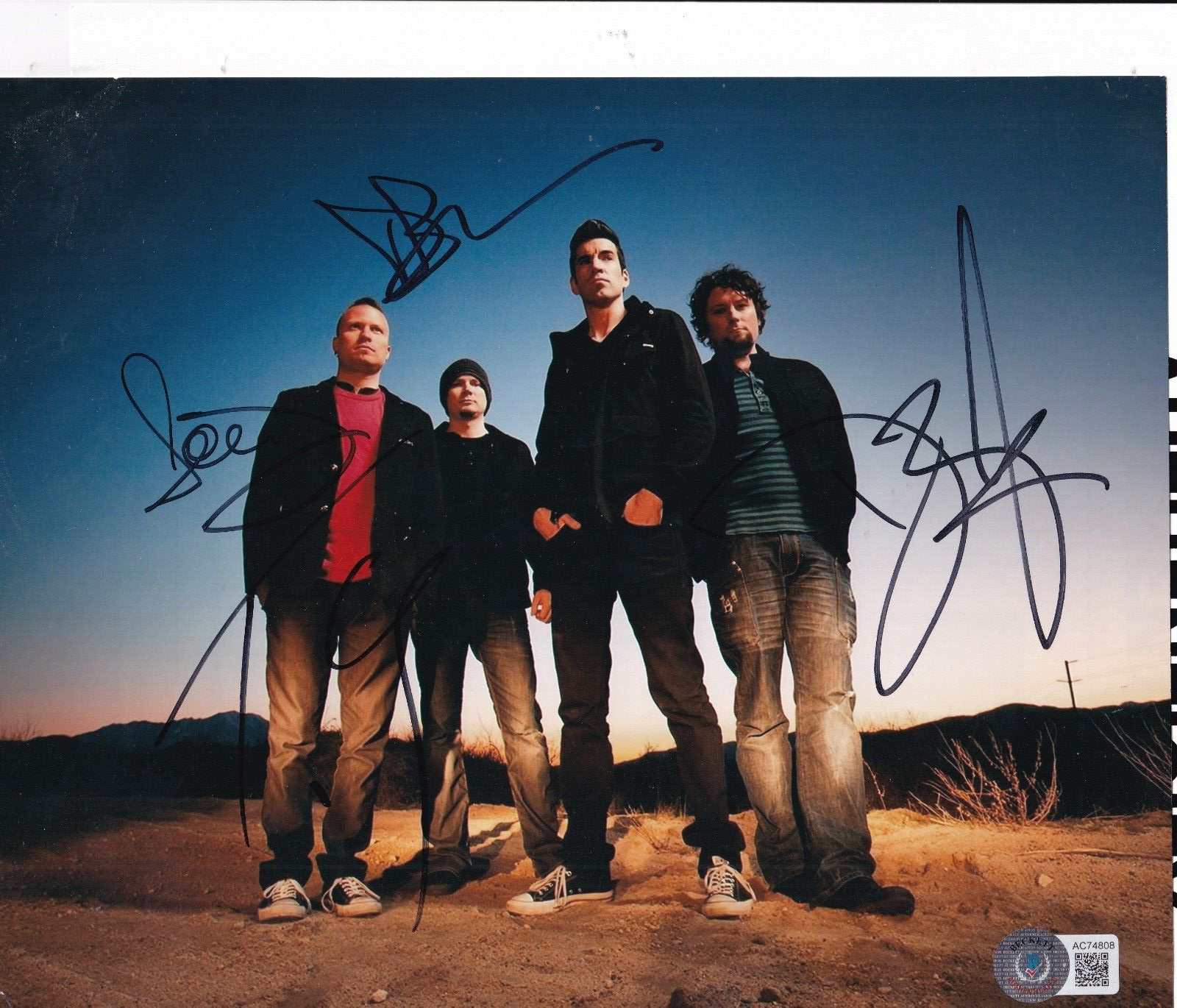 IMAGINE DRAGONS group signed 8X10 photo (BONES EVOLVE) Beckett AC74808