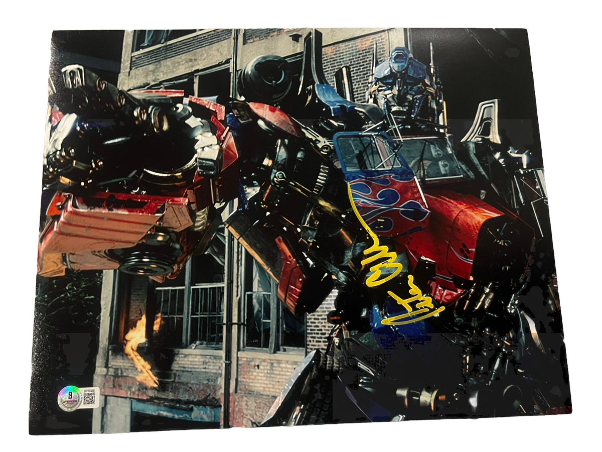 Peter Cullen signed (Transformers) Movie 11X14 photo BECKETT BAS BP59368