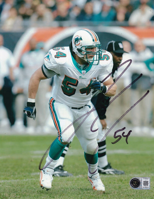 ZACH THOMAS signed (MIAMI DOLPHINS) football 8X10 photo BECKETT BAS BY085805