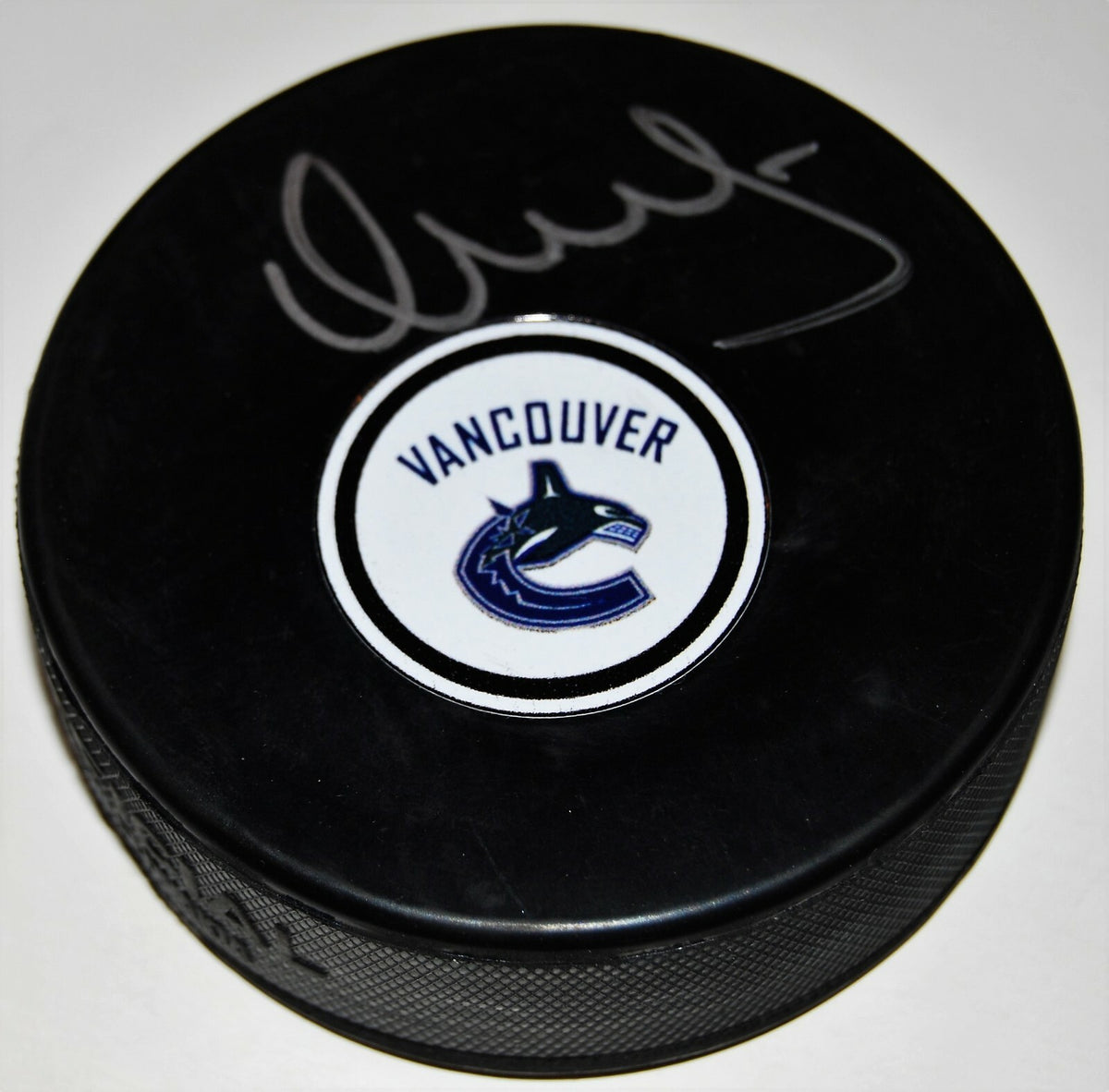 VASILY PODKOLZIN signed (VANCOUVER CANUCKS) autographed hockey puck W/COA