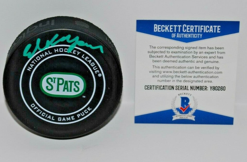 ED BELFOUR signed (DALLAS STARS) Official game hockey puck BECKETT BAS Y80260